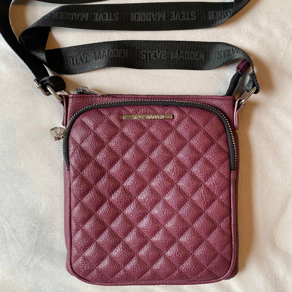 Steve Madden purple quilted crossbody purse with black "guitar" strap